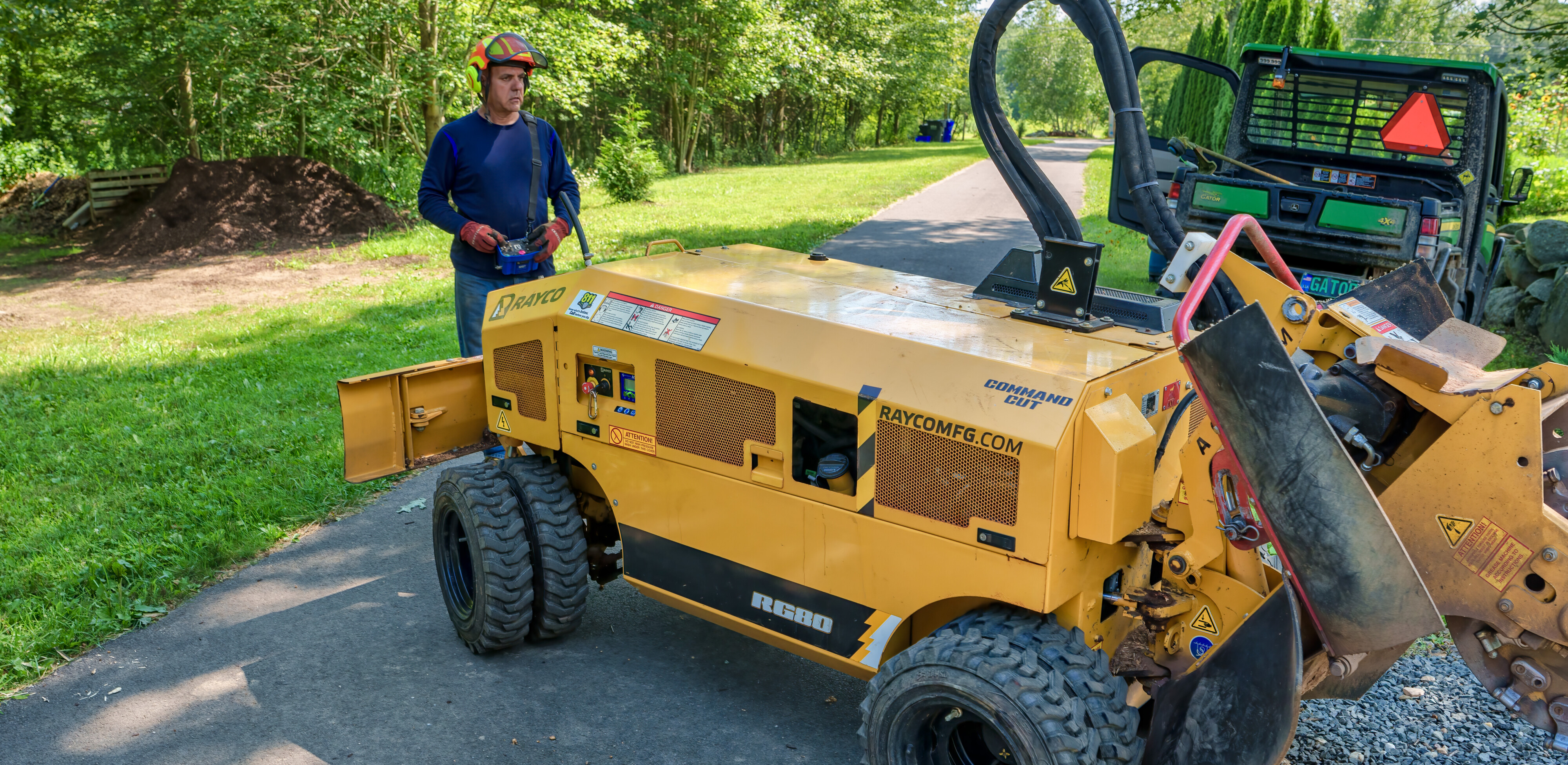 Before and after stump grinding on a residential property in CT